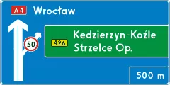 Znak E-1a Tablica przeddrogowskazowa na autostradzie
